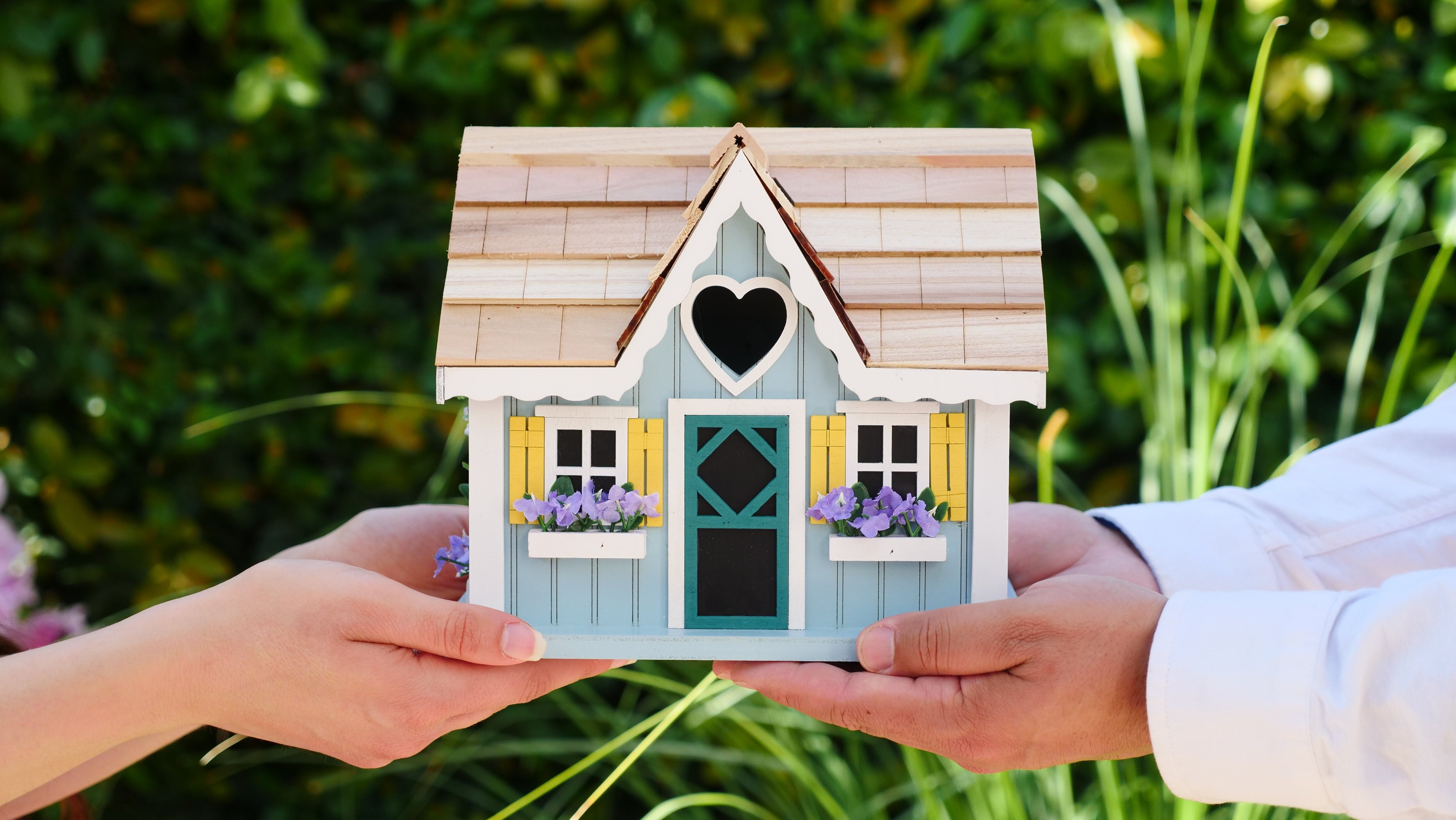 Home held by Hands